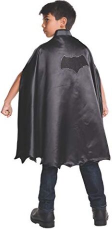 This is an image of a child wearing a batman cape