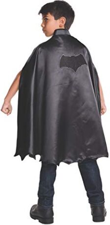 This is an image of a child wearing a batman cape