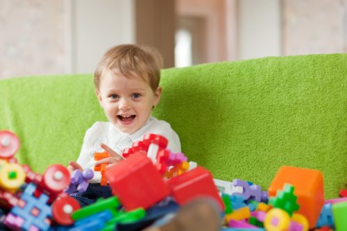 Portrait of three-year child in home interior