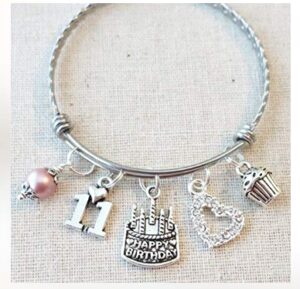 this is an image of a 11th Birthday girl charm bracelet for little girls. 