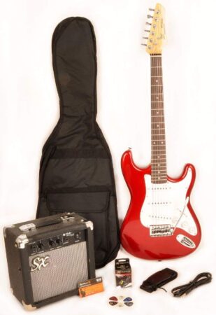 This is an image of kid's electric guitar package with amp and other accessories in white and red colors