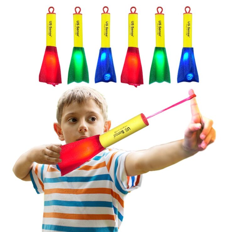 image of a boy stretching a finger rocket in red color