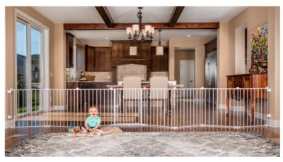 this is an image of a child with the super wide adjustable gate. 