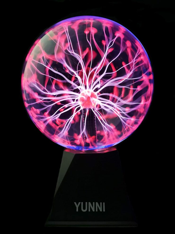 a plasma ball in neon pink on a black background.