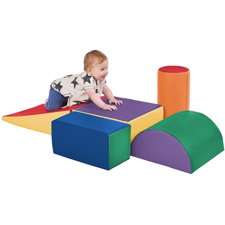 A baby playing with ECR4 Kids Softzone Climb and Crawl Play set.