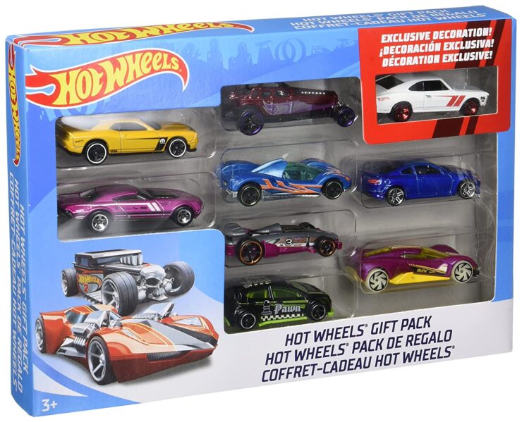 image of assorted Hot Wheel mini trucks in a box