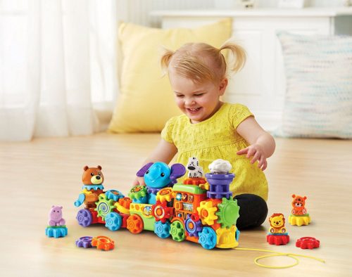 girl playing with kids toy colorful
