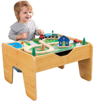 this is an image of kid's kidkraft activity table and train set in multi-colored colors