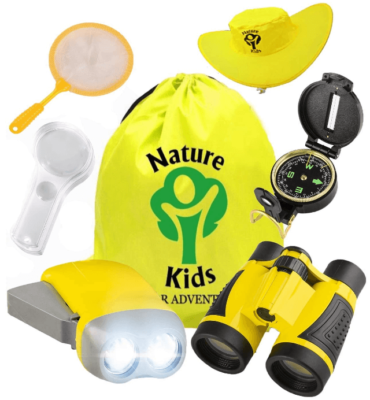 This is an image of boy's outdoor explorer kit with flashligh and glace also a backpack and many other accessories. Yellow color