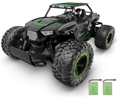 This is an image of monster truck with remote control with Two batteries in black and green colors