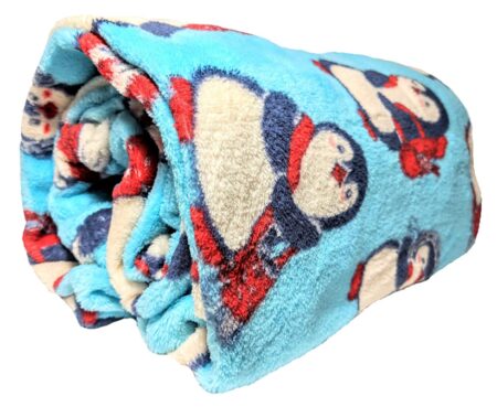 This is an image of a throw blanket with penguin prints.