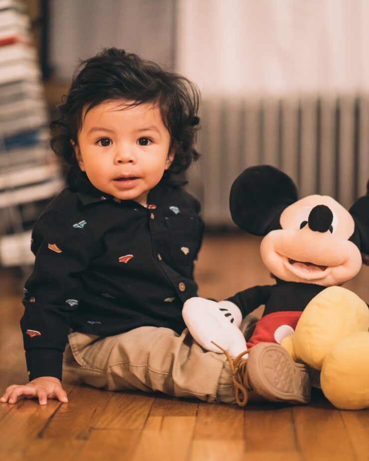 Baby Playing With Mickey Mouse