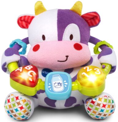 This is an image of little musical cow toy in purple color for babies