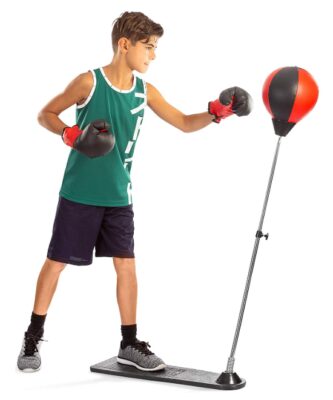 this is an image of a young man working out with the punching ball. 