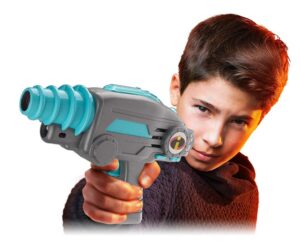 This is an image of Boy aged 10 years old holding a Lazer Tag Blaster toy point it
