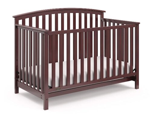 this is an image of a cherry freeport convertible crib for babies. 
