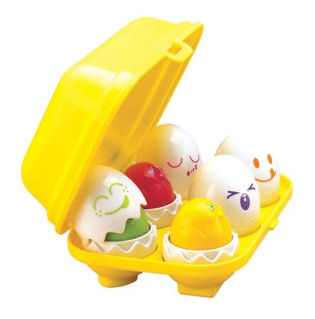 This is an image of a 6 piece cracked egg toys in a yellow egg tray.