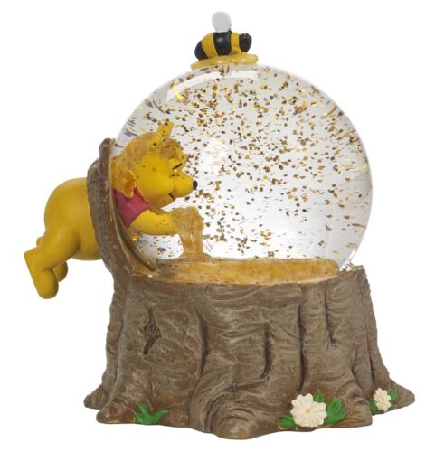 this is animage of a Winnie The Pooh musical snow globe for kids.