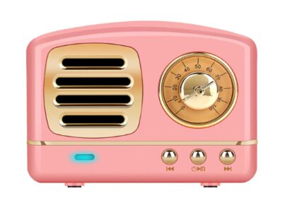This is an image of a pink bluetooth retro speaker. 