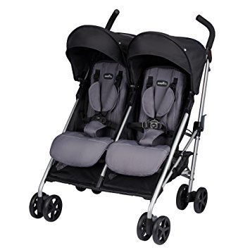 this is an image of a grey double stroller for babies. 