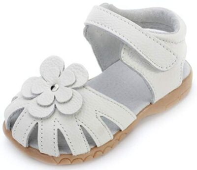 this is an image of a closed toe white leather sandal for little girls. 