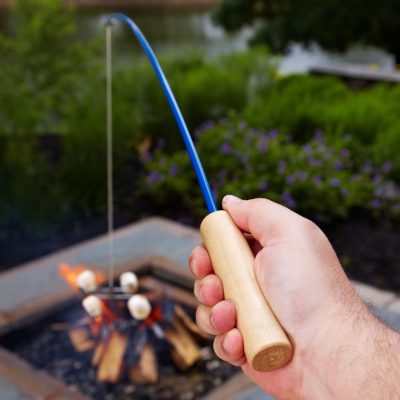This is an image of a blue stainless steel and wooden handle campfire roaster. 