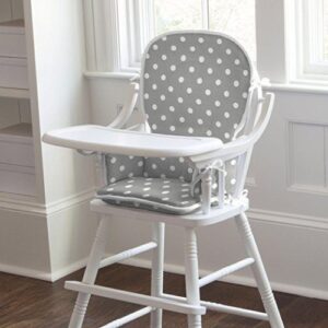 White high chair with spotted high chair pad