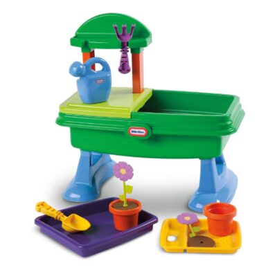 this is an image of a garden table play set for kids. 
