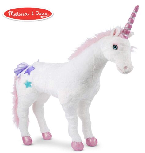 this is an image of a giant unicorn plush for little girls. 