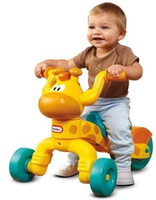 This is an image of babies giraffe design bycle ride on in yellow color