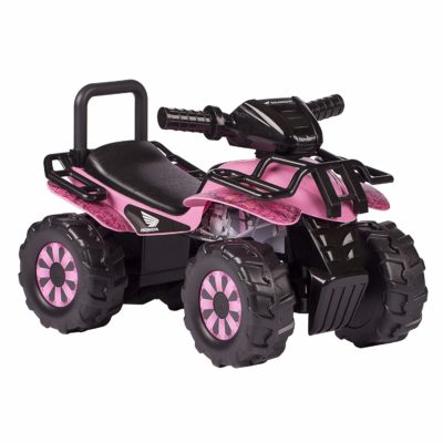 This is an image of a pink ATV by Honda. 