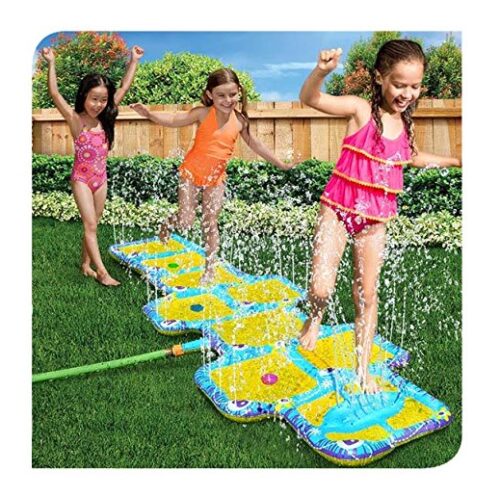  this is an image of 3 young girls using the Hopscotch water splash pad for kids.