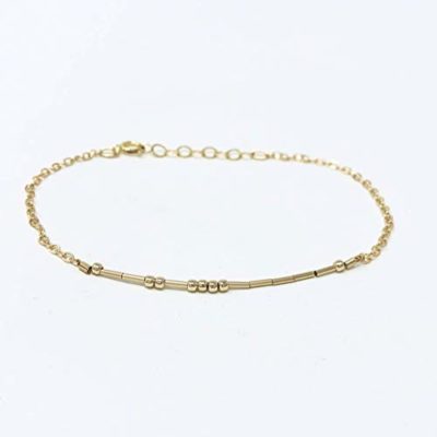 This is an image of a gold filled bracelet by JennyandJude. 