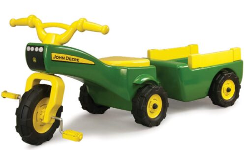 This is an image of Tomy john deere pedal tractor and wagon designed for kids