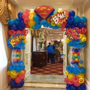 Ka pow superhero ballons at the entrance to another room at a hotel