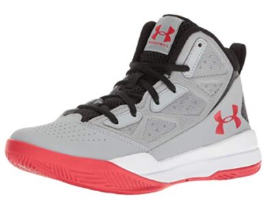 This is an image of a overcast gray basketball shoe by Under Armour designed for kids. 