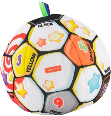 This is an image of kids laugh and learn sining soccer ball 