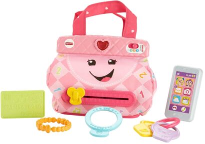 This is an image of kids and toddlers smart purse in pink color with a lot of toys