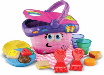 This is an image of a pink picnic basket for toddlers by LeapFrog. 