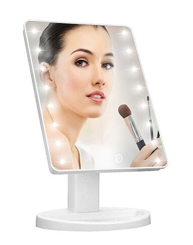 this is an image of a lighted vanity makeup mirror for young ladies. 