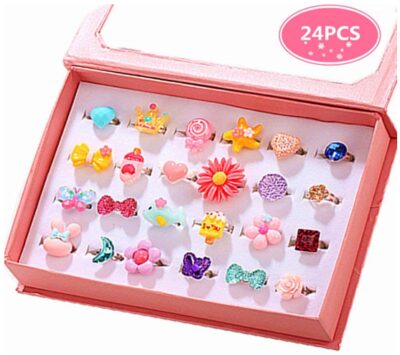 This is an image of girl's little girl jewel rings in box 