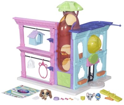 this is an image of a a kid's pet shop playsent that fits up to 30 pet toys. 