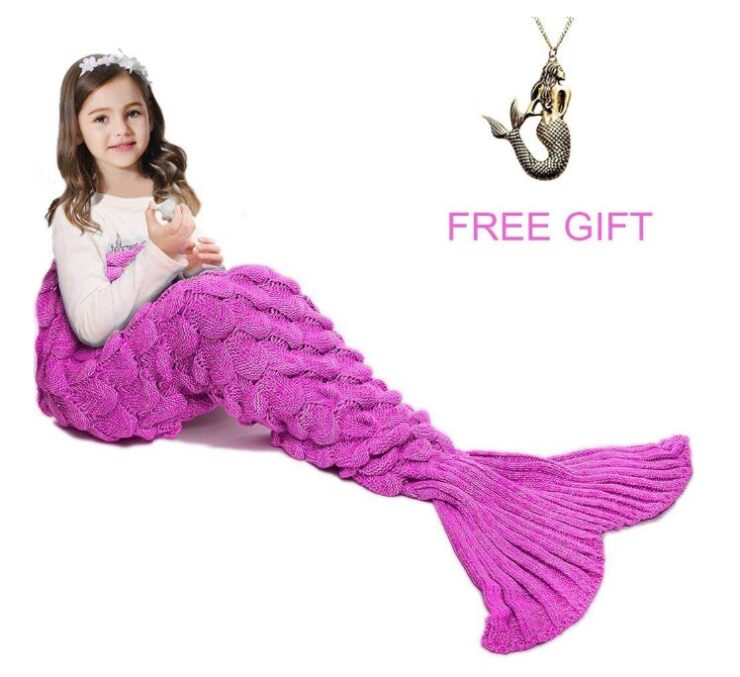 this is an image of a pink mermaid tail blanket for teenage girls. 