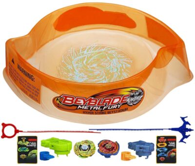 This is an image of kids beyblade in metal with stedium arena for battle in orange color 