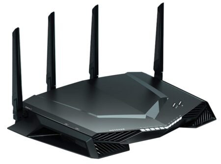 This is an image of a black gaming wifi router by netgear.