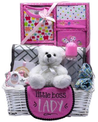This is an image of baby girl basket with toys and gifts in colorful colors