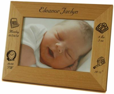 This is an image of a wooden horizontal personalized baby frame.