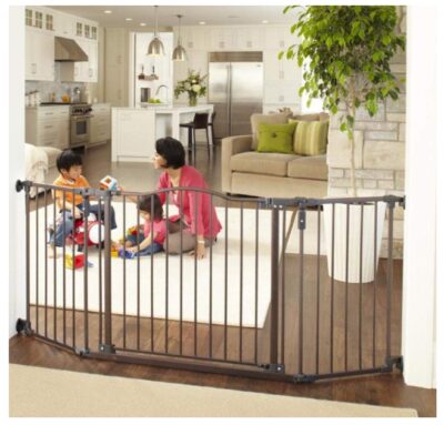 this is an image of a mom playing with her children inside the 72-inch deluxe baby gate.