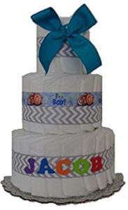 this is an image of a blue diaper cake for baby boys. 