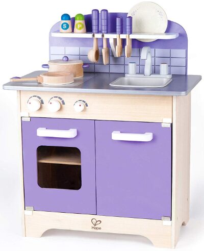 This is an image of small toddler play kitchen in purple color 